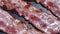 Crispy pieces of tasty bacon is fried on the hot pan, hot boiling fat, cooking meat, meals with meat, bacon for