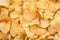Crispy potato chips snack texture background. Generative AI