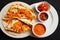 Crispy Quesadillas tortillas with cheese and salsa sauce and pepper