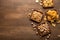 Crispy snacks on background. Pistachios, nuts, crisps and chips in plate and scattered on table