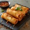 Crispy spring roll with savory sauce, perfect appetizer or snack