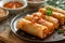 Crispy spring roll with savory sauce, perfect appetizer or snack