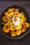 Crispy tater tots doused mercilessly in spicy jalapeno cheese sauce, maple-glazed bacon and sour cream.  Finished with a splash of