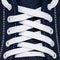 Criss-cross white lacing in new trendy dark blue sports shoe
