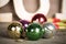 Cristmas colored balls on old wooden board with blured backgroun