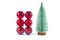 Cristmas decoration:set of red balls and artificial tiny cristmas tree isolated on a white