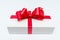 Cristmas white gift box present red bow white background