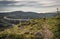 Crni Kal, Slovenia - May 25, 2019: woman admiring upper panoramic view on viaduct of crni kal, beside adriatic sea, slovenia