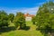 Croatia, old town of Vukovar, city museum in old castle among the trees in park