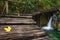 Croatia. Plitvice Lakes. Wooden bridge going up the little waterfall