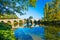 Croatia, river Dobra and old stone bridge in Novigrad