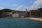 Croatia, Split - view of the Adriatic harbor with a boulevard lined with palm trees