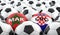 Croatia vs. Morocco Soccer Match - Leather balls in Croatia and Morocco national colors.