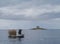 A Croatian fishing vessel and the Mulo lighthouse