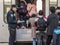 Croatian police officers checking refugees, boarding a train to cross the Croatia Serbia border