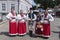 Croatians in national costumes on the street in Zagreb