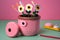 Crochet craft cute flowers on pot over pink background. Art craft, handmade concept. Generative AI illustration