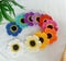 Crochet flower multicoloured background texture handmade crafts diy for decoration