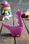 Crochet pink dinosaur. Making toy for child. Handmade crafts. DIY concept. Small business. Income from hobby