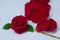 Crochet roses with yarn and crochet needle for giving to those we love, Valentine`s day.