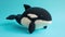 Crocheted killerwhale toy vibrant backdrop, handcrafted and adorable, Ai Generated