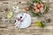 Crockery, eggs in the nest and mimosa branches