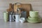 Crockery, tableware, utensils and other different stuff on wooden table-top.Kitchen still life as background for design.