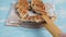 Croffle with chocolate. A popular dish is a hybrid of croissant and waffle. Blue background