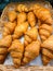 Croissant delicious on a cart in the bakery store.