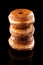 Croissant and doughnut mixture pile isolated on black