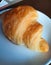 Croissant. Fresh tasty croissants on white plate.