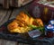 croissant omelet served in a dish isolated on cutting board side view of breakfast on wooden background