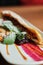 croissant on plate of puff pastry. close-up . wooden background