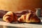 Croissants, bread on a pastel background Commercial photography