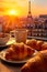 Croissants with coffee against the backdrop of the morning city. In the style of Paris.