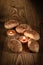 Croissants, pastries, muffins, cakes and pastries on a beautiful wooden background with candles 1