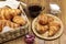 Croissants on wicker plate and in basket