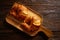 Croissants in wooden board