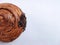 Cromboloni, Round Croissant, New York Roll, a viral pastry combining croissants and bomboloni  on white background