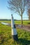 Crooked Belgian boundary marker seen from Netherlands