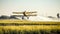 Crop Duster plane spraying crops. Spraying chemicals for accelerated crop growth. Dirty agribusiness