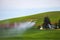 Crop Duster Spraying Green Field