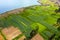 Crop fields in the Peruvian Andes Paca lake in Junin