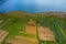 Crop fields in the Peruvian Andes Paca lake in Junin