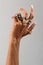 Crop hand of black woman with rings