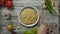 Crop person putting chopsticks near cooked noodles