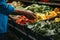 Crop view of someone buying a mix of veggies at the farmers\\\' market