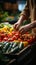 Crop view of someone buying a mix of veggies at the farmers\\\' market
