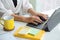 Cropped, Businesswoman working, typing on tablet keyboard