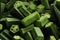 Cropped and chopped pieces of ladies fingers or Okra green vegetables display with selective focus.